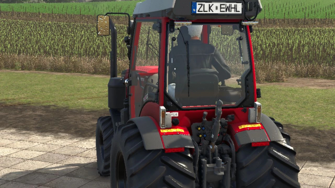 Rear view of Fendt 200 Vario Turbo v1.1.0.0 mod in FS25, showing detailed tractor design with field backdrop.