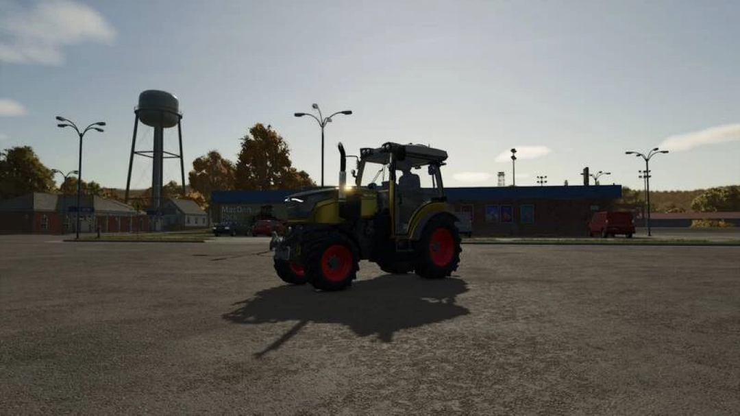 Fendt Vario 200 Edited V1.0.0.1 mod for Farming Simulator 25. A tractor is parked in a rural area with a building and water tower in the background.