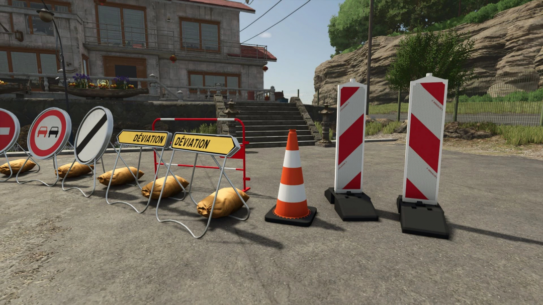 FS25 mod French Temporary Signs v1.0.0.0 showing traffic signs and cones in a virtual outdoor setting.