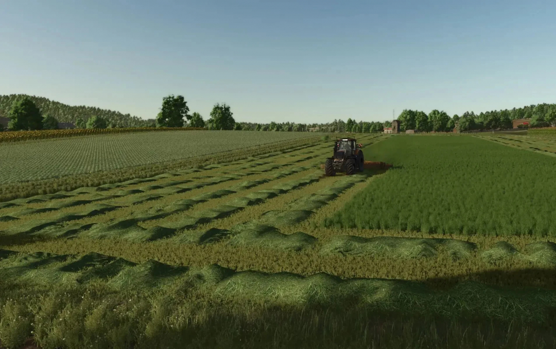 FS25 mod: Grass Texture V1.0.1.0 shows lush fields with a tractor processing rows of mowed grass.