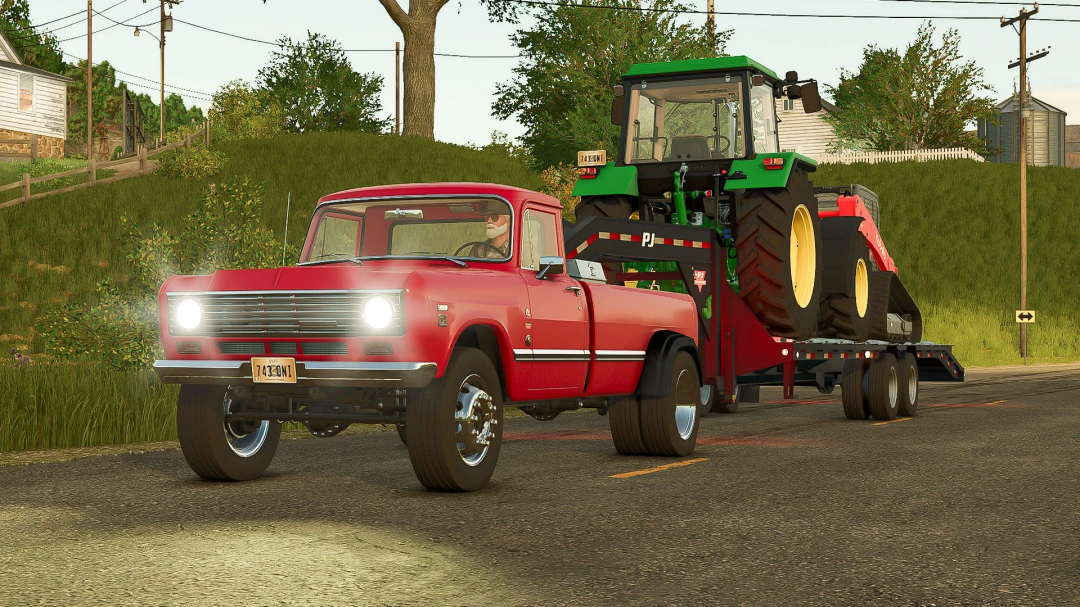 Red truck towing a green tractor on a trailer in FS25 mod, International Series 200 HD v1.1.0.0.