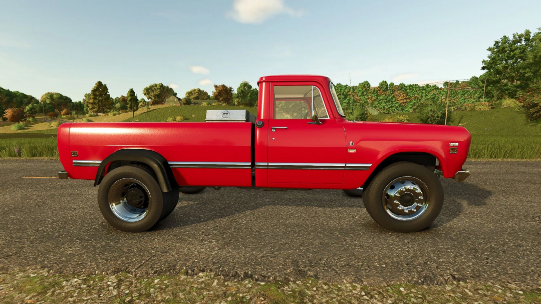 Red International Series 200 HD truck mod in FS25, standing on a rural road with green hills in the background.