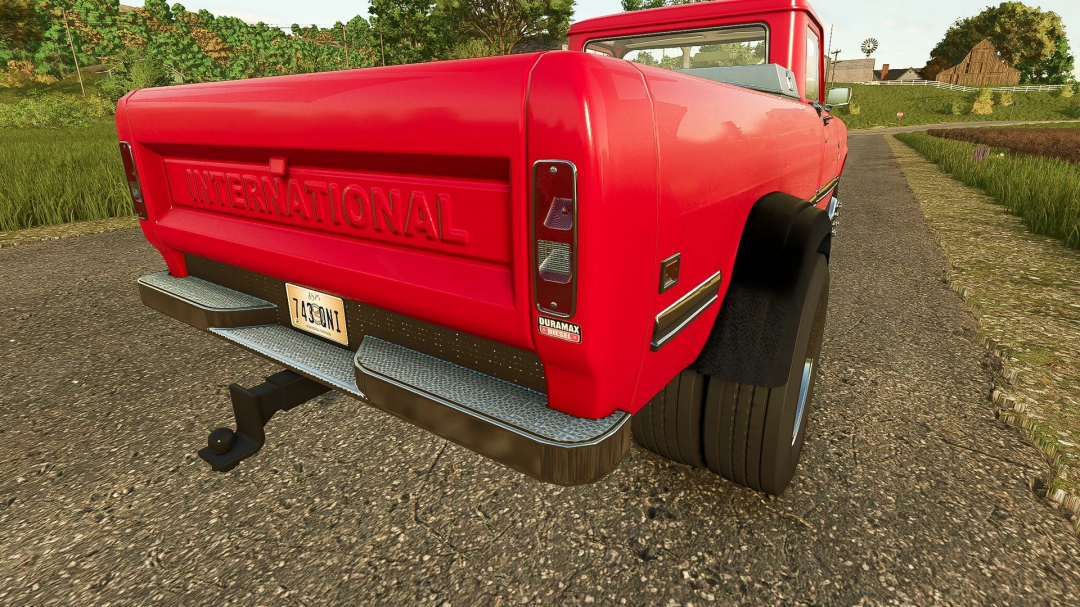 Rear view of red International Series 200 HD mod in FS25, showing Duramax Diesel badge.