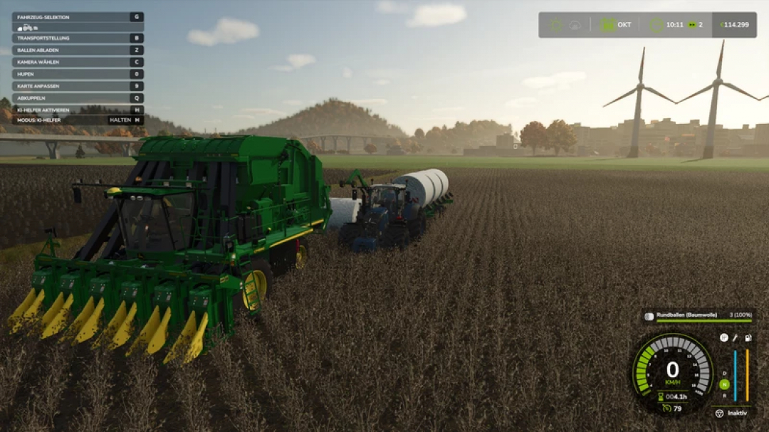 FS25 mod: John Deere Cotton Pack harvesting field with wind turbines in background.