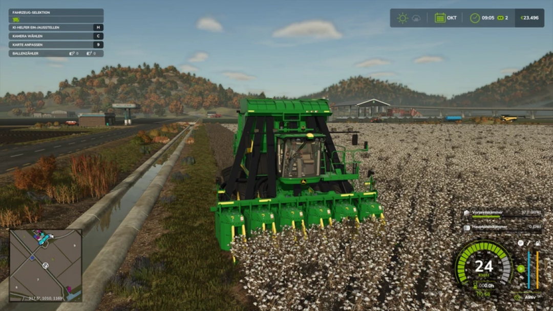 FS25 John Deere Cotton Pack mod showing a green harvester in a cotton field.