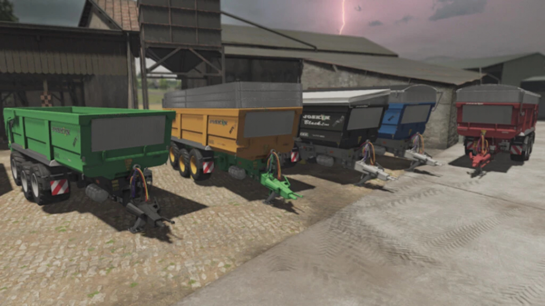 FS22 mod Joskin Trans-SPACE 8000 Advantage trailers in various colors, displayed outside a barn in Farming Simulator 22.