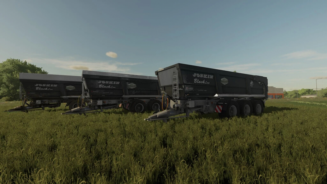 Three Joskin Trans-SPACE 8000 Advantage trailers in a field, part of FS22 mods for Farming Simulator 22.