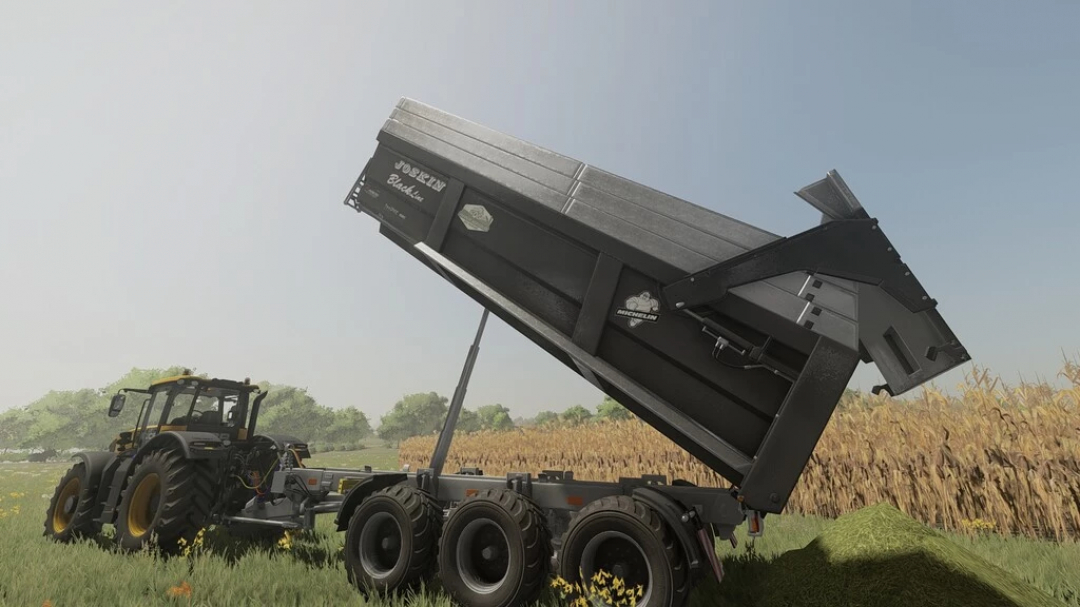 FS22 mod Joskin Trans-SPACE 8000 Advantage v1.0.1.0 trailer unloading grass in a field.