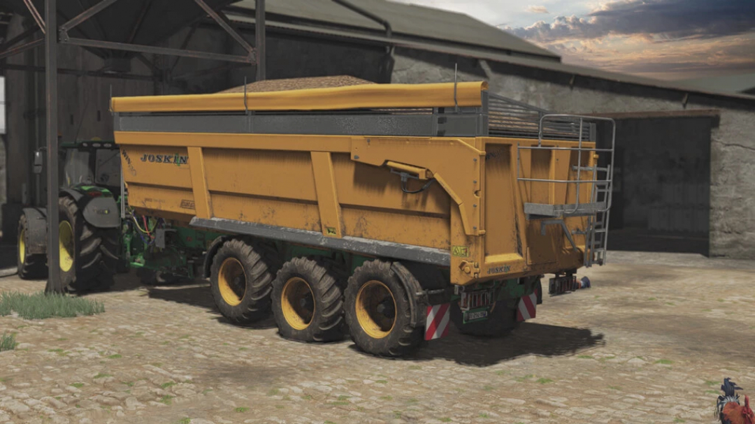 FS22 mod Joskin Trans-SPACE 8000 Advantage trailer in barnyard, realistic Farming Simulator 22 scene.