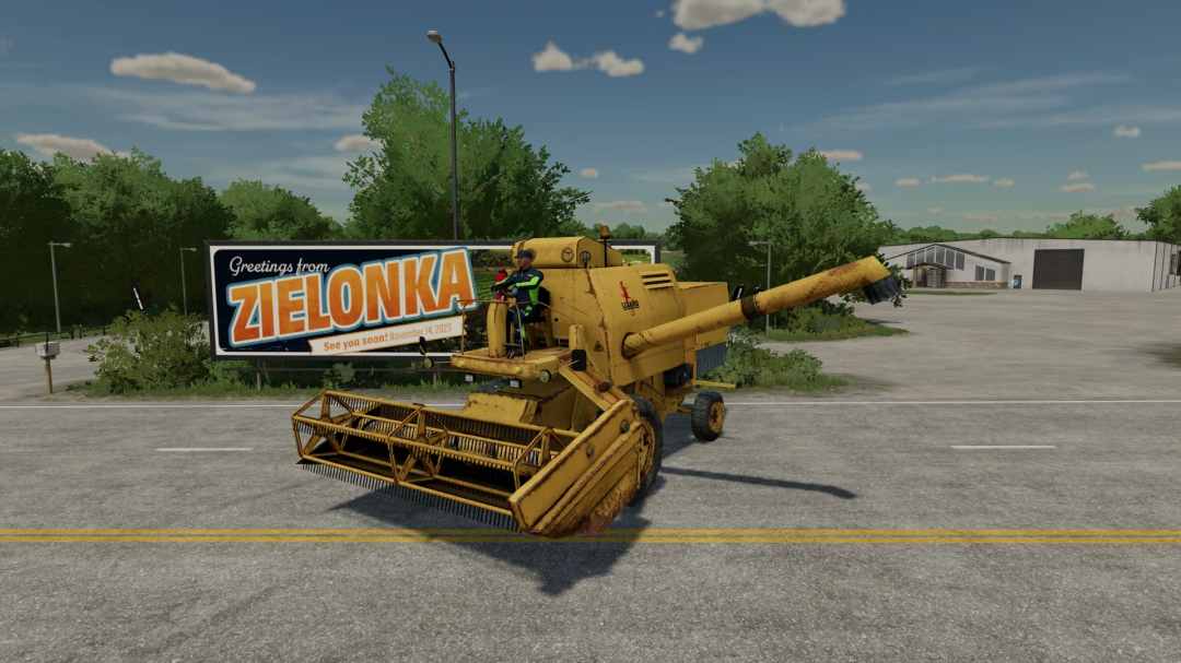 FS22 mod Lizard 7210 v1.0.0.0 harvester in front of Zielonka sign in Farming Simulator 22.