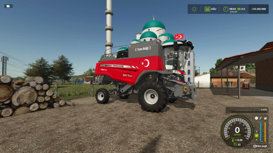 Massey Ferguson Beta 7360 mod in FS25, featuring a red combine harvester parked near a mosque.