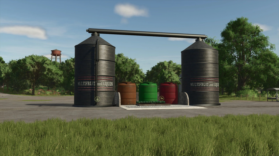 FS25 mods: Multifruit and Liquid Silo v1.0.0.0 with large storage tanks in a green landscape.