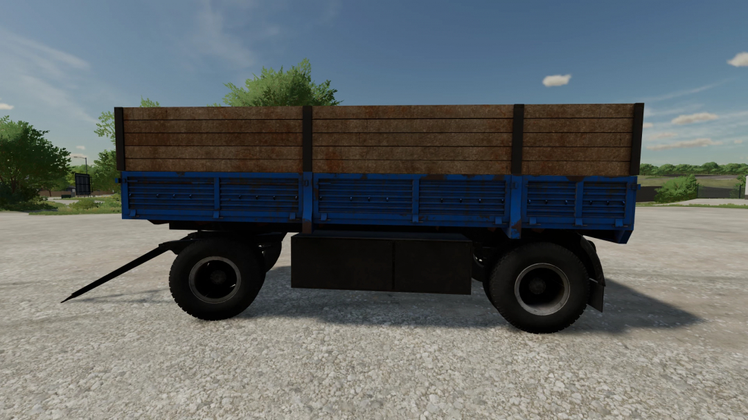 FS22 mod Nefaz v1.0.0.0 depicts a blue trailer with wooden side panels parked on a farm.