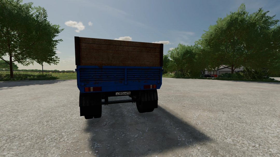 Rear view of Nefaz truck in FS22 mod showing trailer in a rural setting.