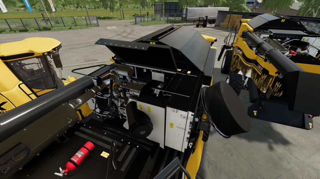 Detailed view of the New Holland CX harvester mod in FS22, showcasing the machinery components and inside workings. Farming Simulator 22 mods.