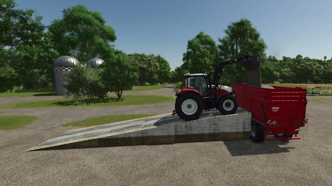 FS25 mod Placeable Ramp v1.0.0.0 with red tractor loading materials into a trailer on a sunny farm.