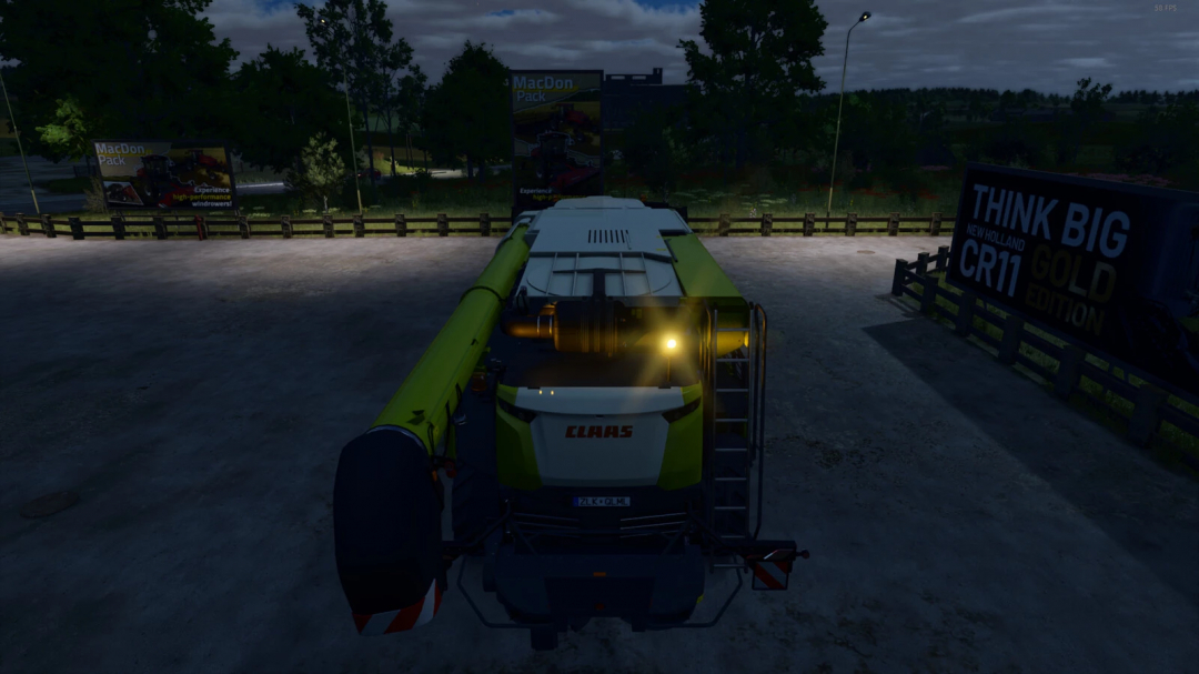 FS25 mod Random Beacon Light Speed shows a Claas harvester with lights on at night.