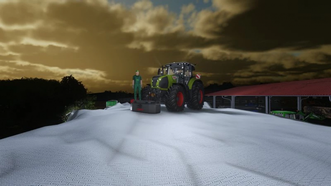 FS22 mod image: Tractor parked on a large tarp-covered silage mound at sunset, Save live from wrzosow v1.0.0.0.