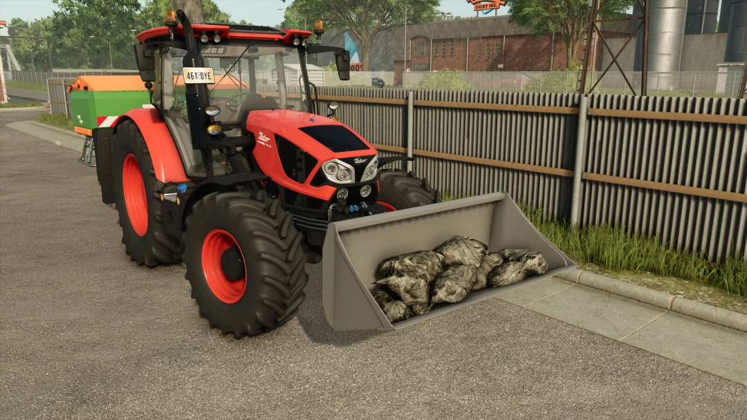 Red tractor using Shovel Weights v1.0.0.0 mod in FS25, loaded with rocks.