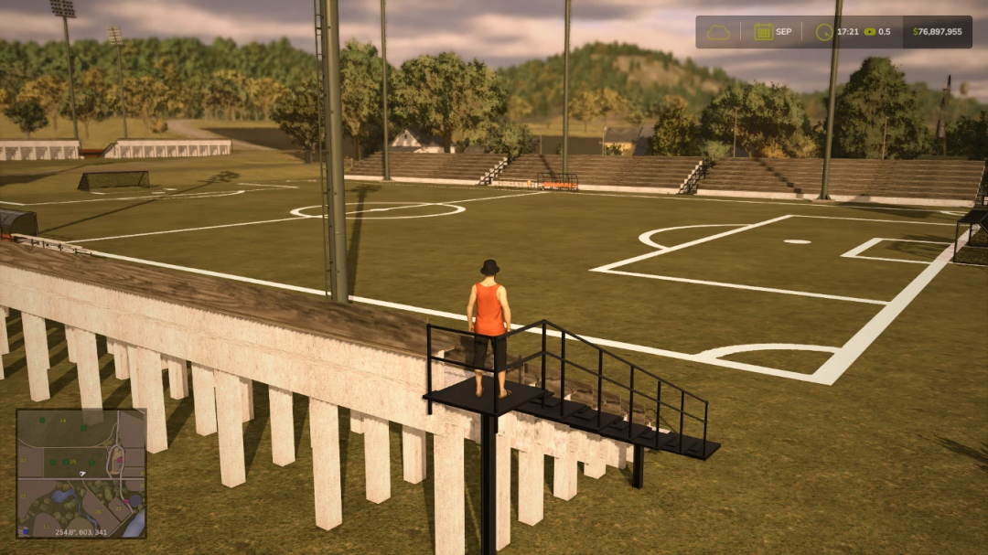 FS25 mod Soccer Field v1.0.0.0 showcasing a detailed soccer field with stands and a player character in Farming Simulator 25.