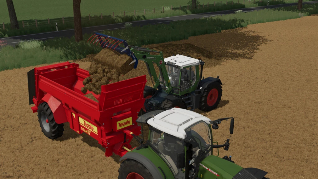 FS22 mod Stoll Frontloader pack on a farm, unloading onto a Teagle Titan 17 trailer.