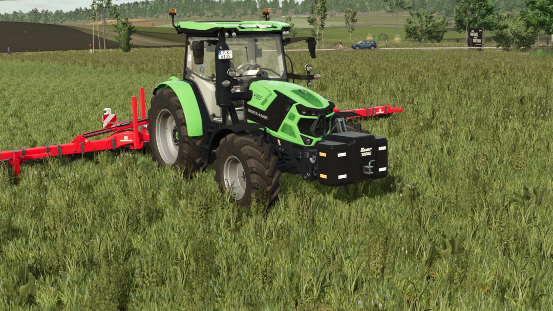 FS25 mod with tractor using Suer Weight Pack v1.0.0.0 on green field