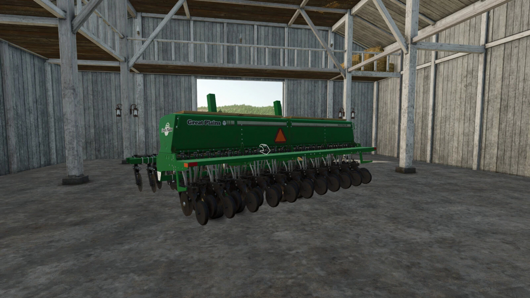 Great Plains seeder in FS25 mod showcasing farming equipment in a wooden barn.