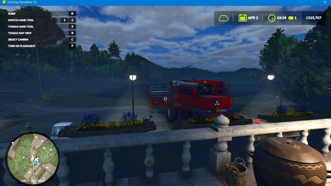 FS25 mod TimeKeeper: Real-time gameplay view, red harvester parked, night scene with controls display.