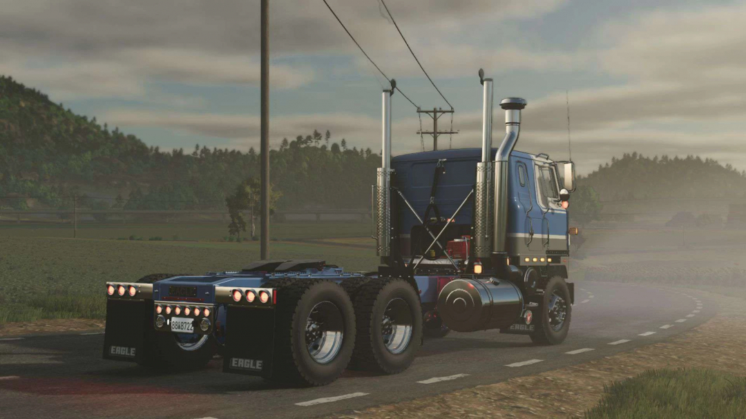 FS25 mods: Transstar International truck mod on a rural road in Farming Simulator 25.