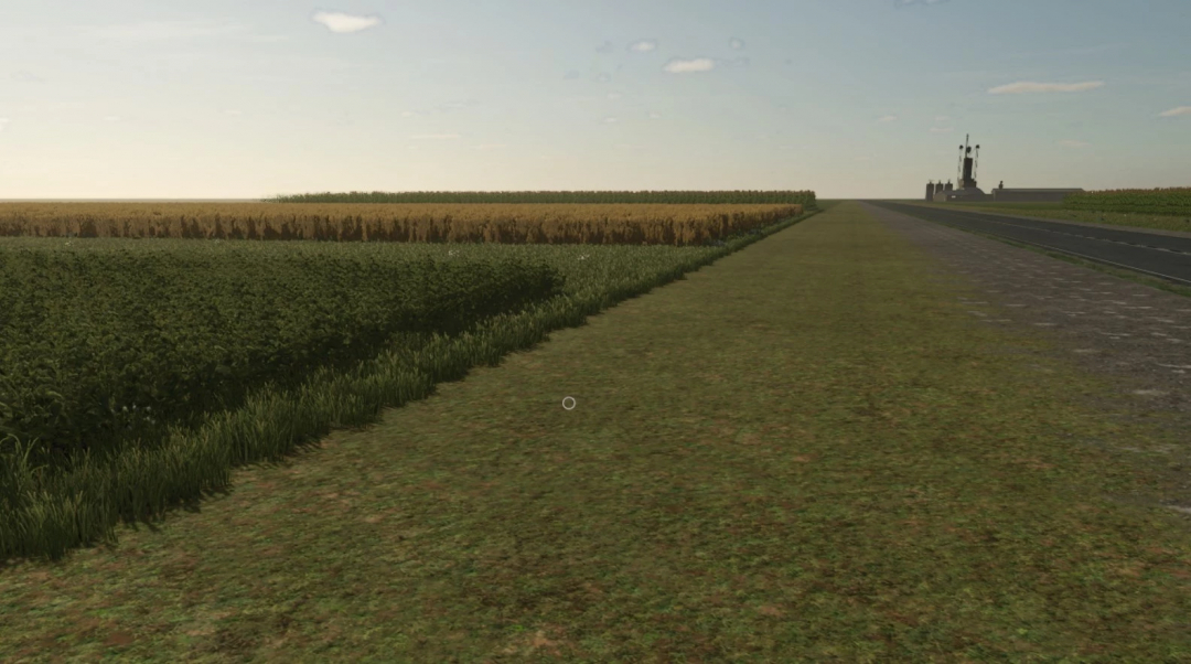 FS25 US Flatlands Map 4x v1.1.0.0 showcasing vast fields and a distant factory.