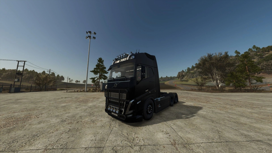 FS25 mod Volvo FH16 Edit v1.0.0.1 showcasing a black truck in an open, rural environment.