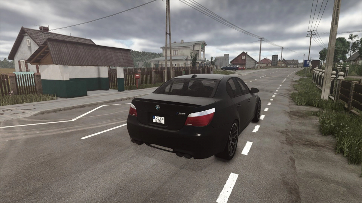 fs25-mods,  BMW E60 mod for FS25 on a rural road, showcasing detailed car design.