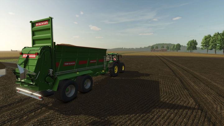 fs25-mods,  Bergmann TSW 6240 W mod in Farming Simulator 25, a green trailer on a plowed field under a clear sky.