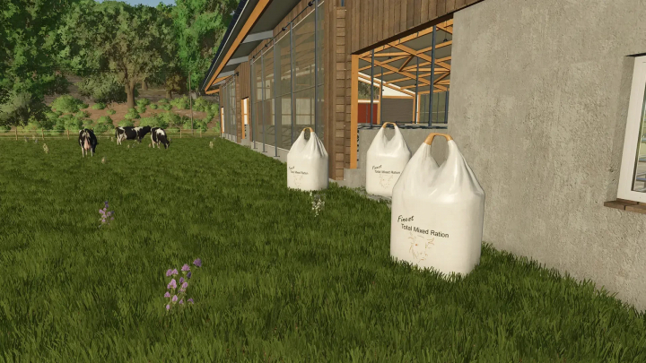 fs25-mods, FS25 mod image showing Big Bags with finished TMR near barn, surrounded by grazing cows.