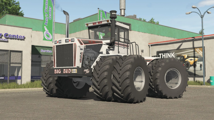 fs25-mods,  Big Bud 450 tractor mod in Farming Simulator 25 displayed outside a service center. FS25 mods enhance the gameplay.