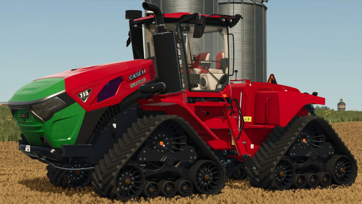 fs25-mods, FS25 mod Case IH Steiger 715 Quadtrac in a field, showcasing tracked wheels and vibrant red and green design.