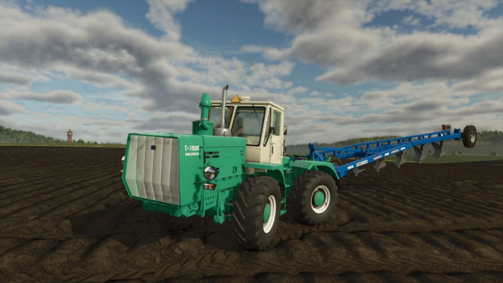 fs25-mods,  HTZ T-150K tractor mod in FS25, depicted on a plowed field under a cloudy sky.