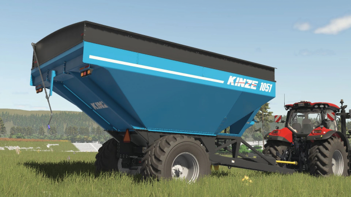 fs25-mods, FS25 mod Kinze Wagon Pack v1.0.0.0 showing a blue grain cart attached to a red tractor in a field.