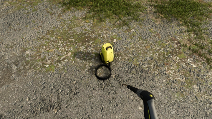 fs25-mods, FS25 mod Kärcher K2.14 v1.0.0.0 pressure washer on gravel path in Farming Simulator 25.