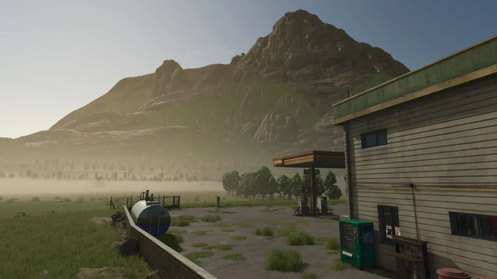 fs25-mods,  FS25 LoneHills mod v1.0.2.0 features a rural gas station at sunrise with mountains in the background.