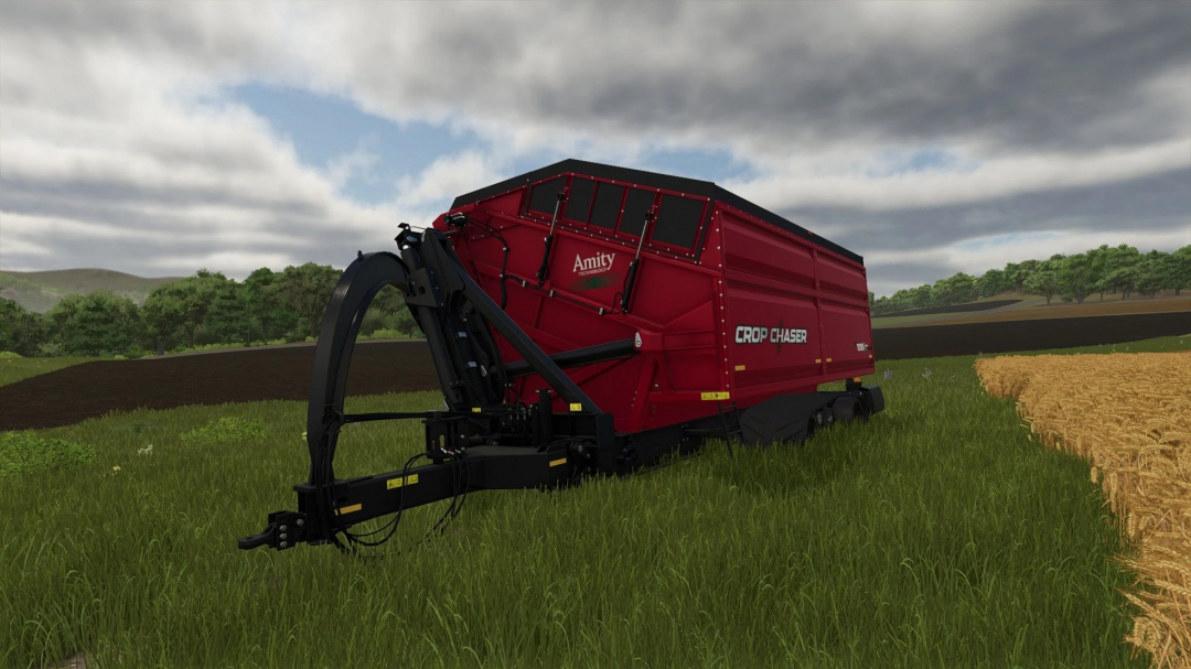 The Amity Crop Chaser 1000 Edit v1.0.1.0 mod for FS25 shown in a grassy field.