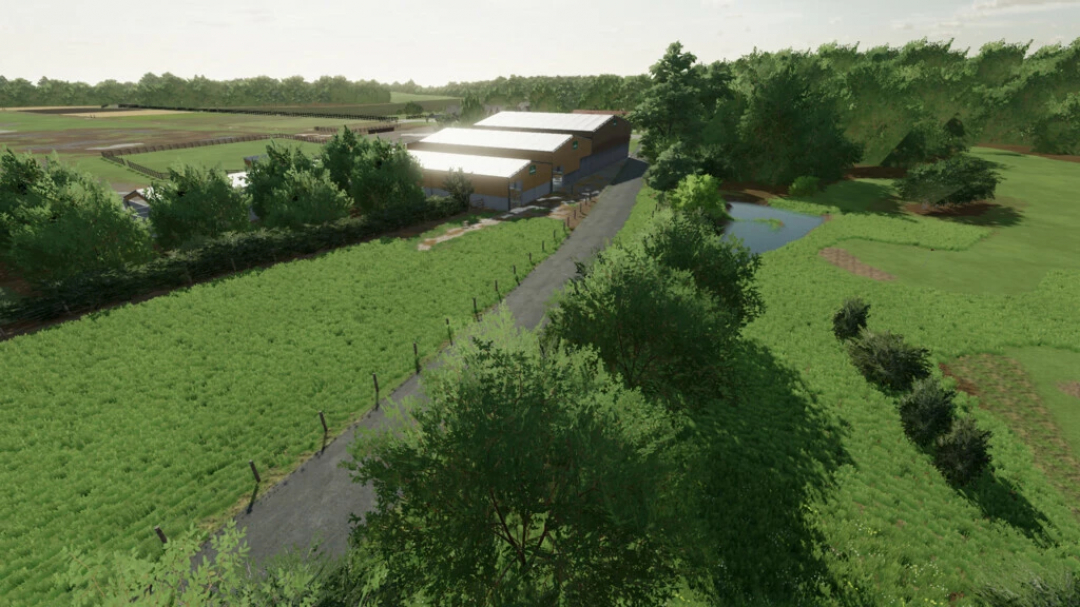 Ballam Rd Dairy Farming mod for FS22 shows a countryside with barns, fields, and trees.