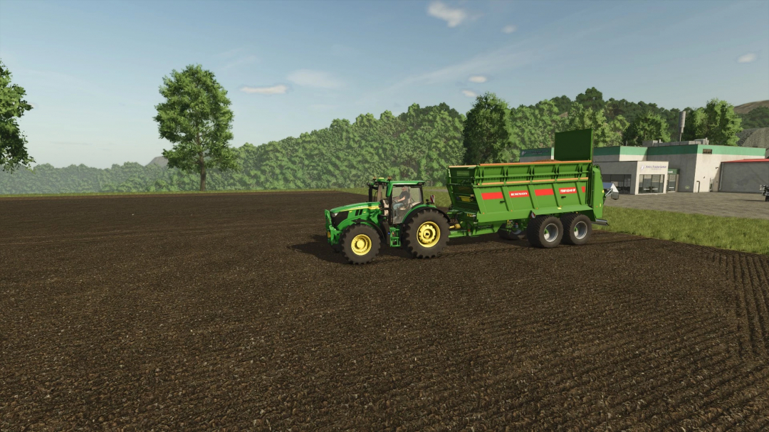 Bergmann TSW 6240 W mod in FS25 on a farm field showcasing trailer and tractor.