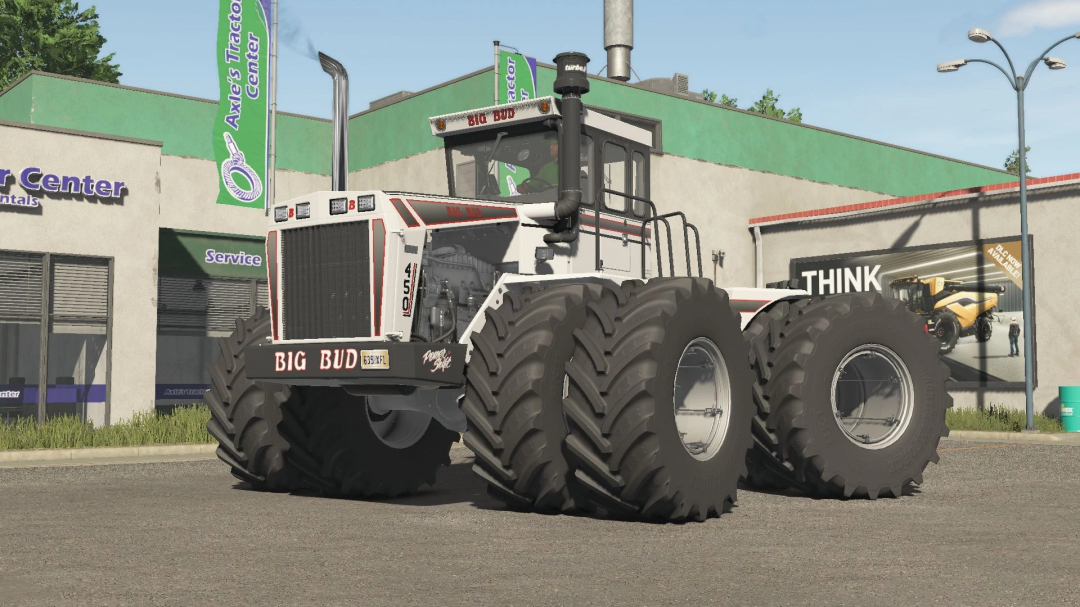 Big Bud 450 tractor mod in Farming Simulator 25 displayed outside a service center. FS25 mods enhance the gameplay.