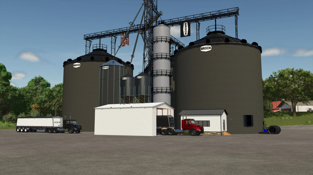 FS25 Brock Silo Complex mod showing large silos and vehicles in a farm setting.