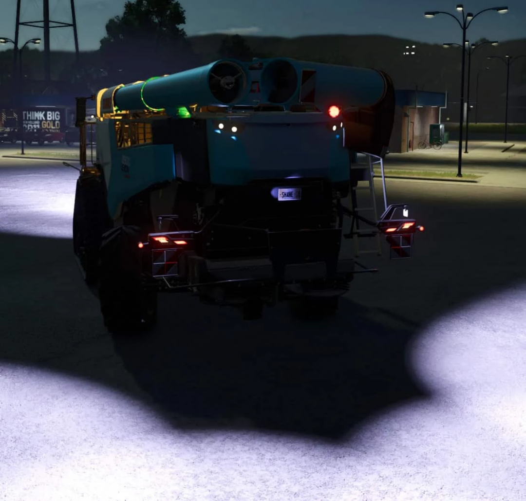 FS25 mod CUSTOM CLAAS LEXION 8900 at night with headlights on, showcasing Farming Simulator 25 mods.