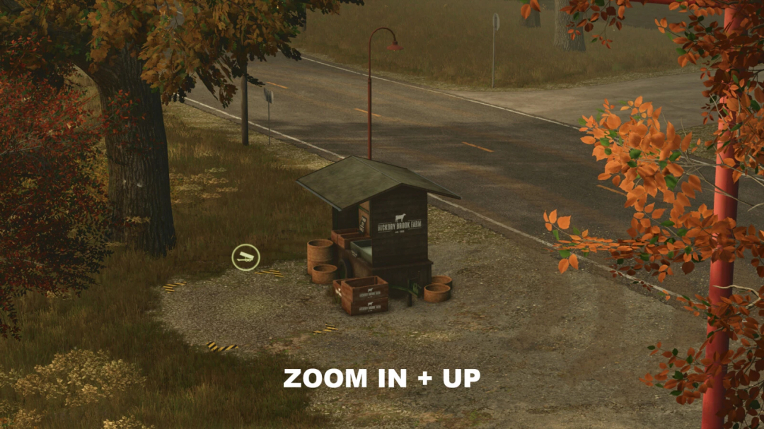 FS25 mod Camera Zoom v1.1.0.0 showcases enhanced zoom on a roadside farm stall in autumn, enhancing gameplay visuals.