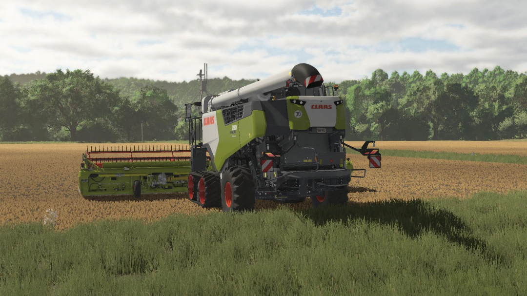 FS25 mod Claas Trion 700 v1.0.0.0 combine harvester in a wheat field.