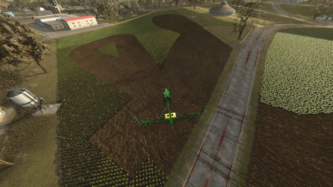 FS25 John Deere Planter mod in action on a large field in Farming Simulator 25.