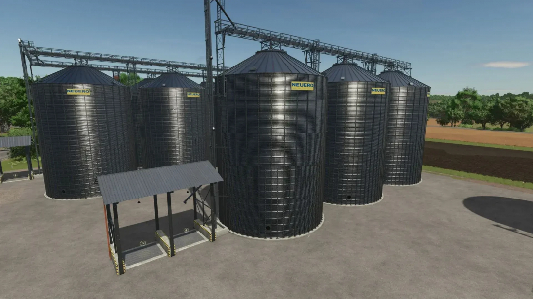 FS25 Multifruit Silo v1.0.2.0 in Farming Simulator 25 mod, featuring large metal silos in a farm setting.